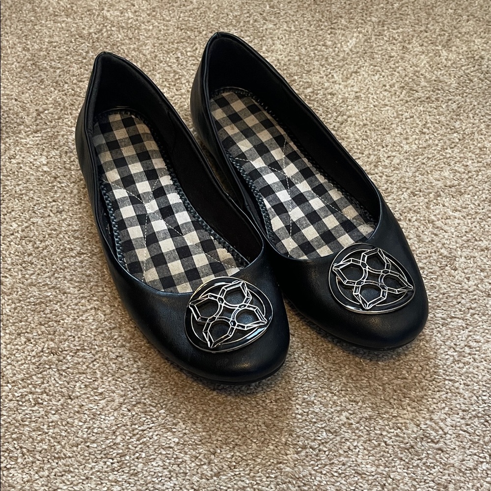 Kelly & Katie Black Flats with Silver Medallion Accent